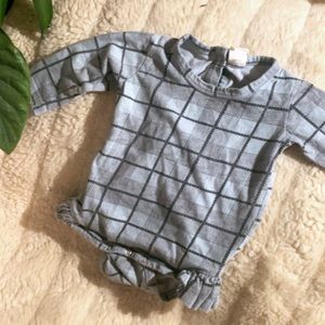 Kate Quinn long sleeve ruffle leg